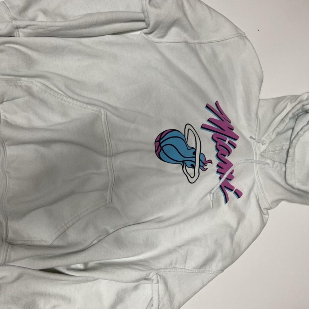 Miami Heat hoodie with blue basketball graphic and purple 'Miami' text #basketba